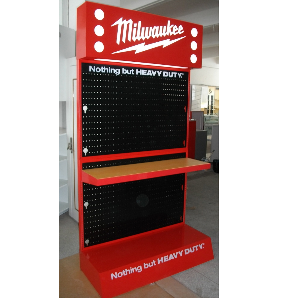 Estantería metálica expositora para ferreterías, herramientas eléctricas y manuales, con una amplia gama de ganchos y accesorios.